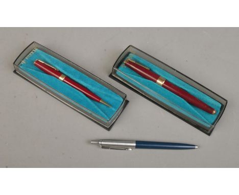 Two Parker pens along with a Parker propelling pencil. Two cased examples. Includes fountain pen and a ballpoint example.  