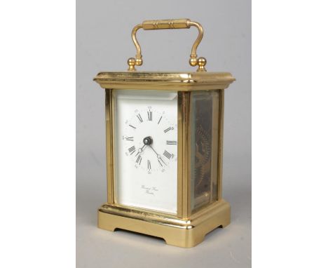 A Bornand Freres, Bichester carriage clock, with beveled glass panels and open top escapement.  No key.
