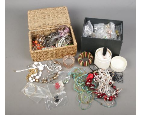 Two boxes of assorted costume jewellery to include large collection of beaded necklaces, earrings, bracelets, etc.  