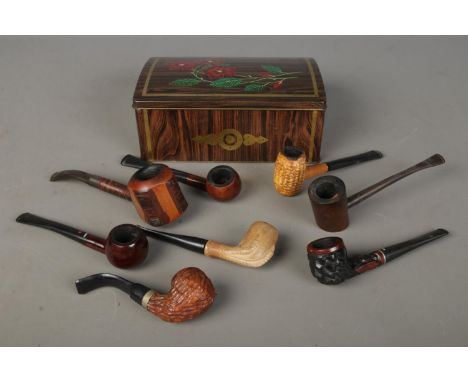 A collection of vintage smoking pipe including Bruken and cup &amp; claw examples in a vintage tin.  