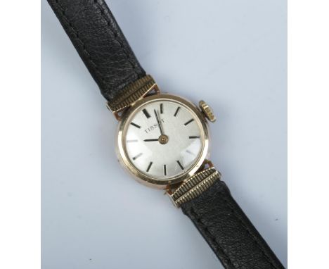 A ladies 9ct gold Tissot manual wristwatch. With box and papers.  