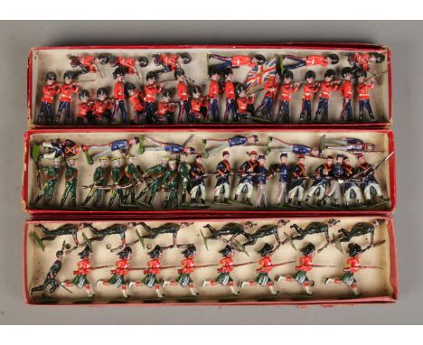 Three boxes of vintage W Britain (Britains) lead soldiers, including Princess Lousie's Argyle and Sutherland Highlanders (No.