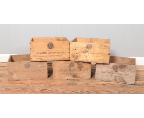 Five vintage wine crates; all stamped for Domaine de Fontsainte, product of France.  