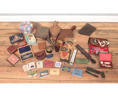 A large quantity of collectables, top include vintage tins, 'Lorrely' razor, compass set, woodenwares, souvenir photographs, 