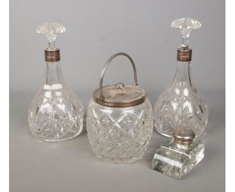 Four pieces of silver mounted glassware, to include three piece Joseph Rodgers &amp; Sons decanter and ginger jar set, and a 