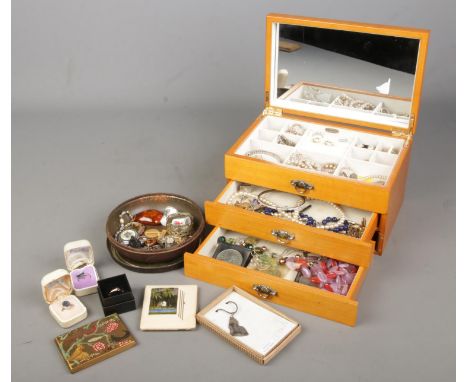 A quantity of costume jewellery including silver ring and thimble, simulated pearl necklaces, cigarette case with butterfly d