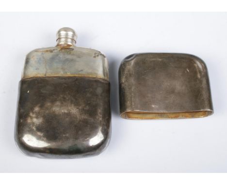 A Victorian silver hip flask, with partial crest to the front and detachable cover. Assayed for London, 1861 by Charles Rawli