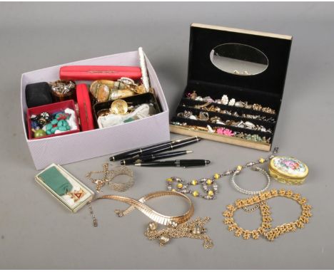 A collection of assorted vintage costume jewellery to include Onyx earrings and pendant, bracelets, several pairs of earrings