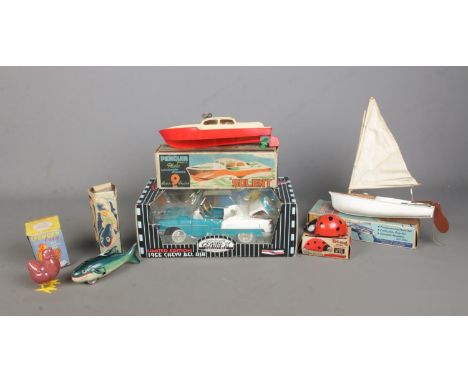 A collection of vintage toys, to include Tri-ang 8" Lugsail Dinghy and Ladybird, Leghorn Lucy and Penguin Solent, together wi