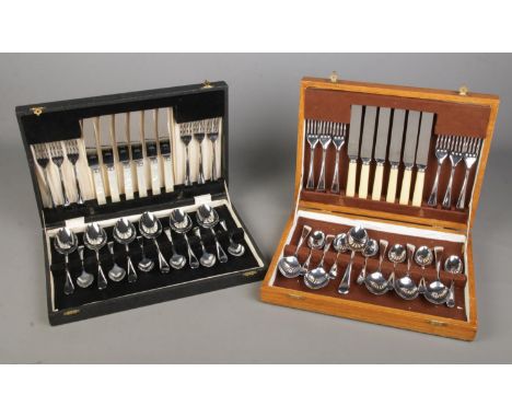 Two vintage canteens of cutlery with examples of Schofields of Sheffield and Sheffield Superior Cutlery England one having mo