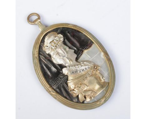 A large pendant depicting a portrait of a maiden. The portrait set in white and yellow metal, having seed pearl decoration an
