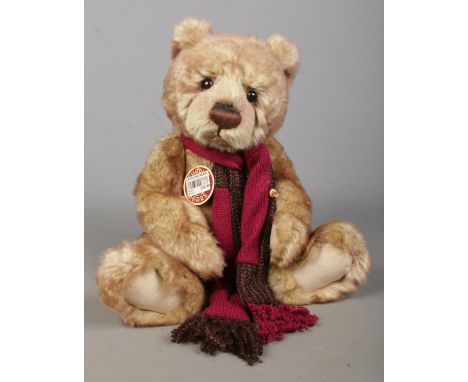 A Charlie Bears jointed teddy bear, Adam. Exclusively designed by Isabella Lee. With scarf and cardboard swing tags. CB194557