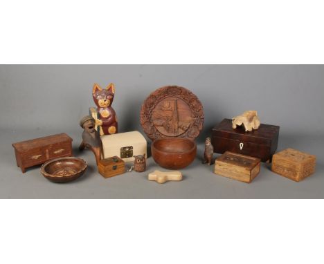 A good collection of woodenwares, to include chests, turned bowl, jewellery boxes, owl tape measure and novelty nut cracker. 