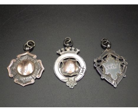 3 silver and gold fob medals&nbsp; - one hallmarked Birmingham 1915 by Herbert Bushell &amp;Son Ltd, next hallmarked Birmingh