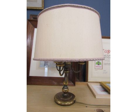 A brass based lamp with shade&nbsp;