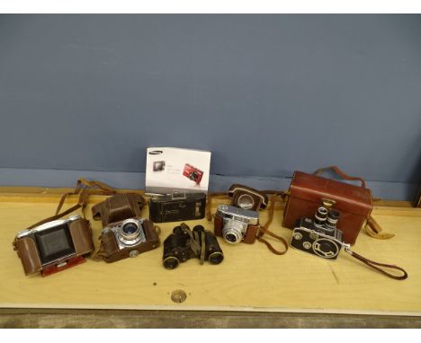 Vintage cameras, movie camera, binoculars and films etc&nbsp;