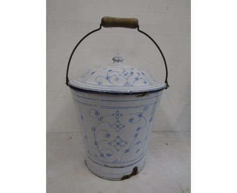 A blue &amp; white enamel lidded pail with handle
