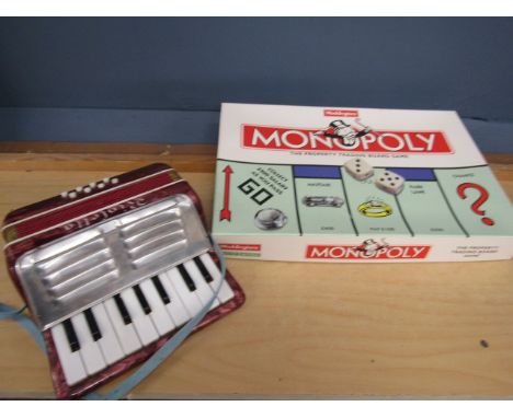 An accordion and Monopoly game