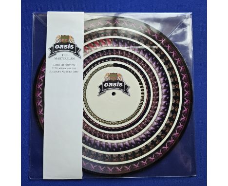 Oasis The Masterplan Double Zoetrope Picture Disc Numbered Mint Housed in a pvc sleeve with numbered sash, everything is mint