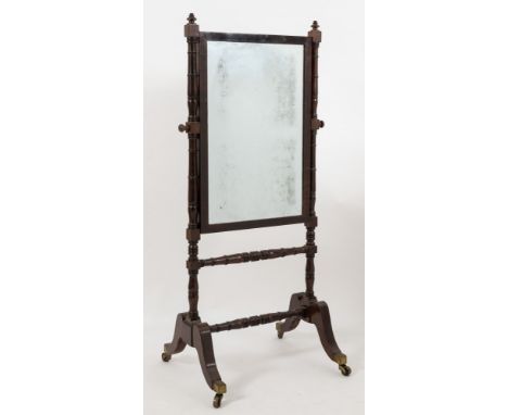 A Regency mahogany and inlaid swing frame cheval mirror:, with a rectangular plate in ebony strung surround and with ring tur