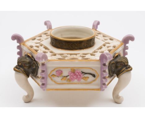 A Royal Worcester aesthetic movement japonaise vase: in the form of an hexagonal  reticulated tripod incense burner decorated