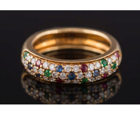 An 18ct gold, emerald, ruby, sapphire and diamond half-eternity cluster ring: pave-set with small circular brilliant-cut diam