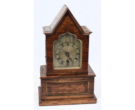 An English Regency rosewood mantel clock: the eight-day duration, timepiece chain fusee movement having an anchor escapement 