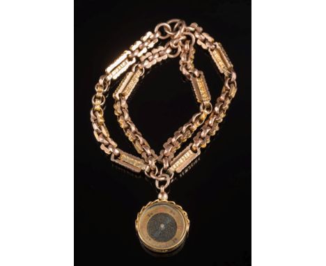 A fancy link bracelet: composed of 19th century gold watch chain linking with attached compass pendant.