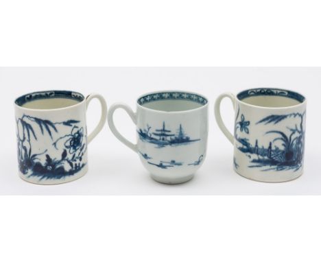 A pair of Worcester First Period porcelain coffee cans and a cup: the former painted in blue in the Candle Fence pattern, ope