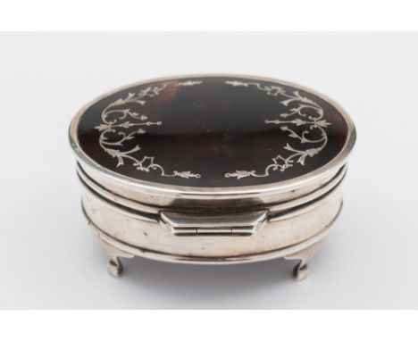 A George V silver, tortoiseshell and piquet inlaid oval ring casket, maker Adie Brothers, Birmingham, 1927: the hinged lid en