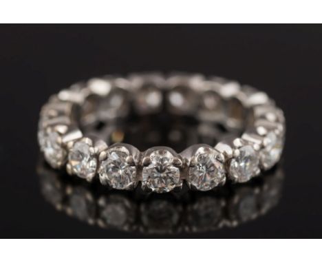 A diamond eternity ring: with seventeen circular, brilliant-cut diamonds each approximately 0.1ct, assessed as being G/H colo