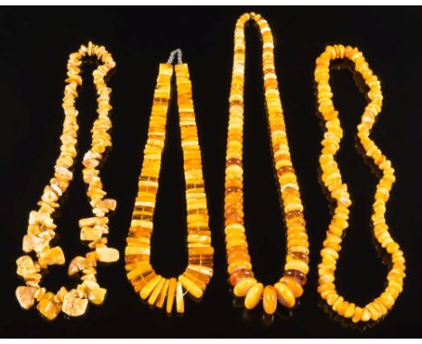 Four Amber bead mounted necklaces: of natural unheated Baltic amber and other beads.
The first with 108 flat round beads grad