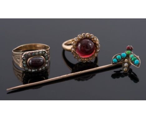 A circular cabochon garnet and rose diamond cluster ring:, a garnet and seed-pearl cluster ring and a turquoise mounted stick