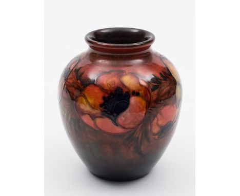 A Moorcroft pottery flambé vase: of oviform tubelined in the Poppy pattern in red, purple, blue and orange on a flambé ground