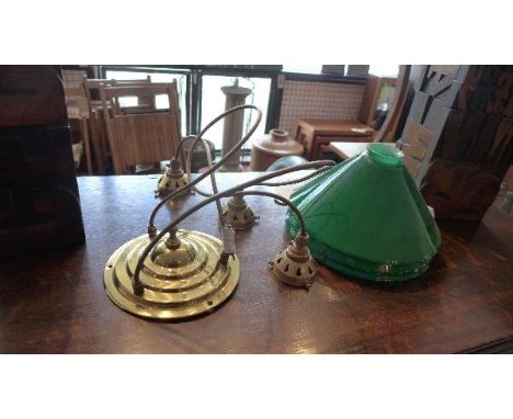 A Christopher Wray brass ceiling light, with three green glass pendants 