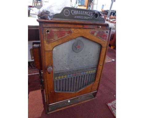 A vintage penny machine, 'The Challenger' 