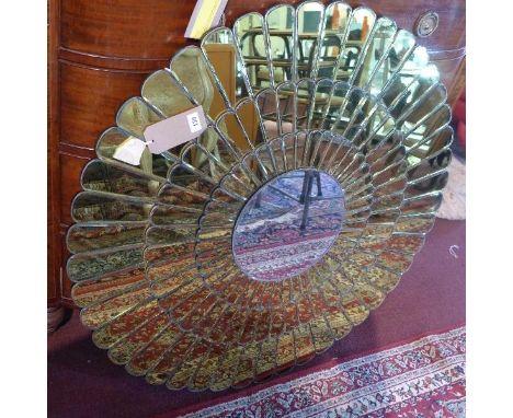 A contemporary sunburst mirror, with beveled edges, Diameter 100cm 