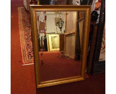 A contemporary gilt framed mirror, with bevelled plate, 68 x 99cm 
