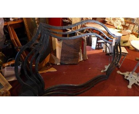 A large iron framed garden mirror, 172 x 108cm 