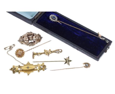 Three 9ct brooches, 7.7gm; together with four assorted stick pins