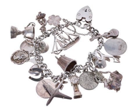 Silver charm bracelet, set with twenty charms including plane, longcase clock, trophy, horseshoe, St Christopher etc. 1.5oz t