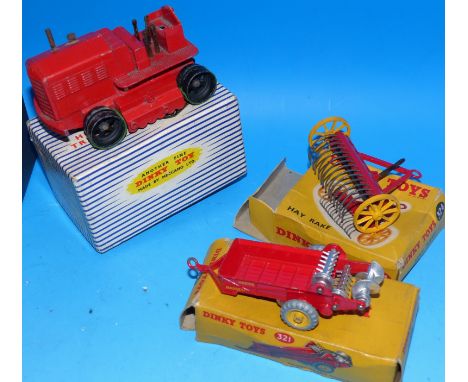 Three boxed Dinky vehicles:  heavy tractor, No 963 (tractor tread a.f.); a Massey-Harris manure spreader, No 321; a Hay rake,