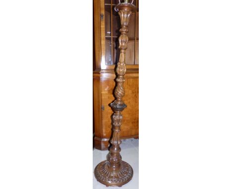 A walnut carved and turned standard lamp