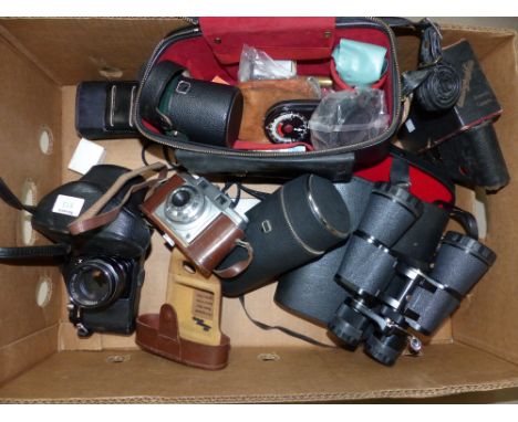 A Pentax SLR camera with 2 spare lenses, bag, and accessories; a 1930's Brownie; other cameras and binoculars
