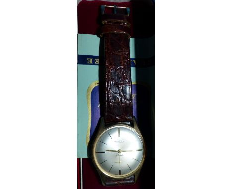 A gent's Rotary hallmarked gold wristwatch with presentation inscription