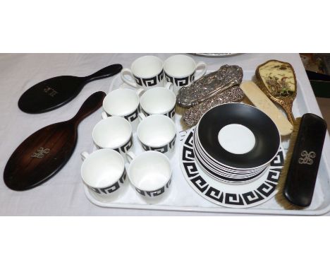 A Susie Cooper design Wedgwood 18 piece coffee service; a selection of mirrors and brushes