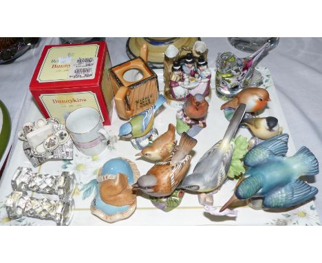 A collection of Royal Worcester birds; miniature and decorative china