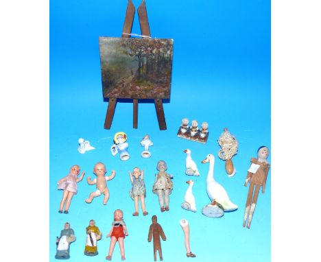 A Victorian miniature oil painting on easel; a selection of miniature dolls and figures