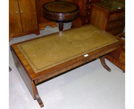 a reproduction mahogany drum shaped occasional table and a similar sofa style coffee table