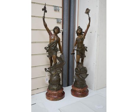 A pair of allegorical spelter figures after Ferrand 'Automobile' and 'Aviation', circa 1907, 72cm
